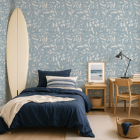 Modern bedroom with abstract brush stroke  light blue patterned wallpaper, surfboard, and wooden furniture.