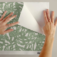 Brushstroke peel and stick wallpaper sample swatch in sage green