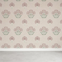 Floral patterned wallpaper with pink and green flowers on a beige background