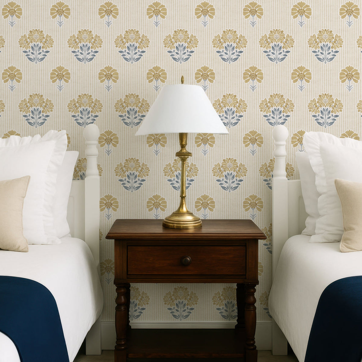 Vintage floral wallpaper in Ochre and Slate Blue in bedroom with dark wood furniture and lamp