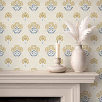 Vintage floral wallpaper in Ochre and Slate Blue on fireplace wall with neutral cottage decor