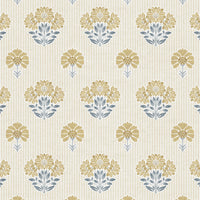 Vintage block print floral wallpaper close up showing hand-drawn pattern in Ochre and Slate Blue