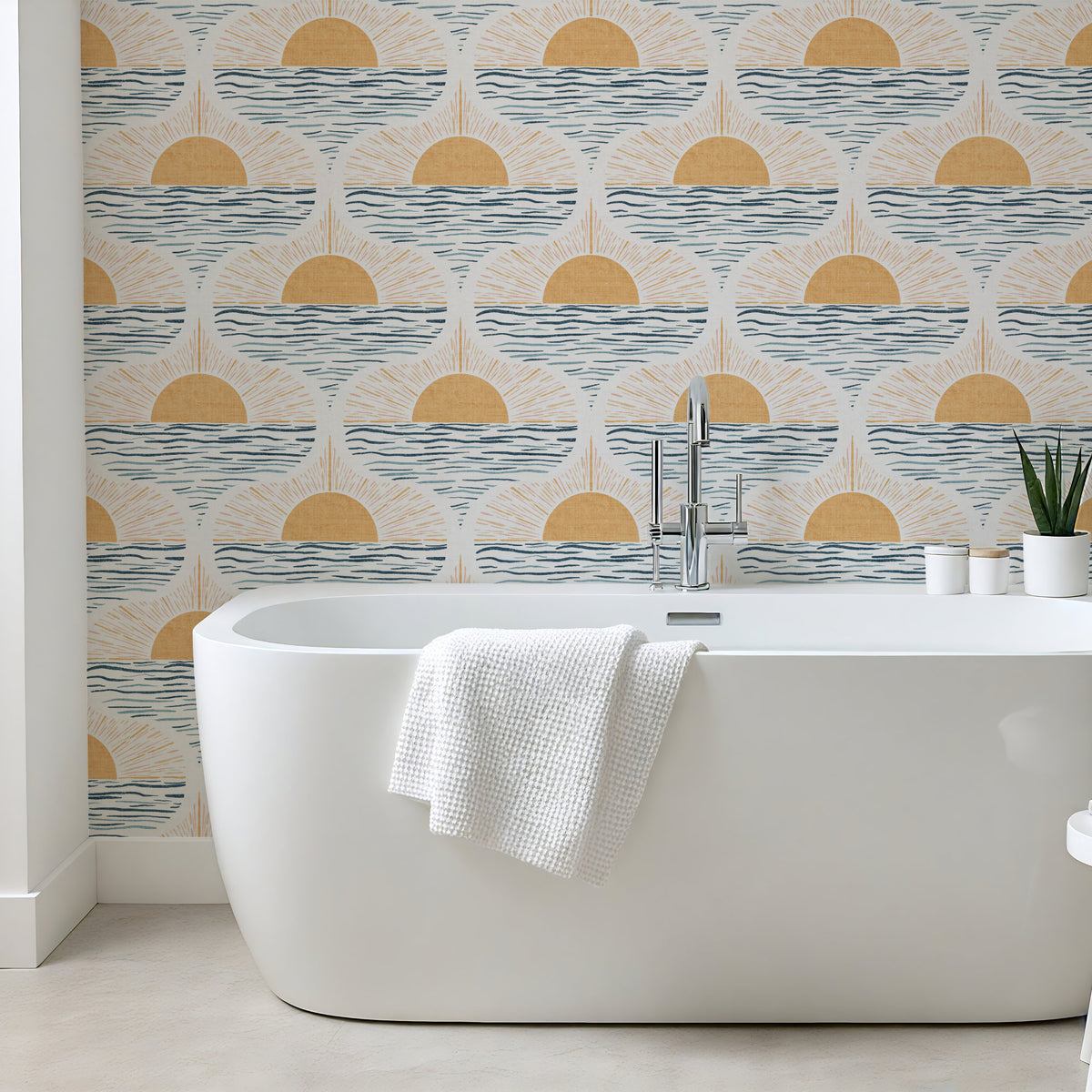 A modern bathroom featuring boho coastal wallpaper behind a btah tub