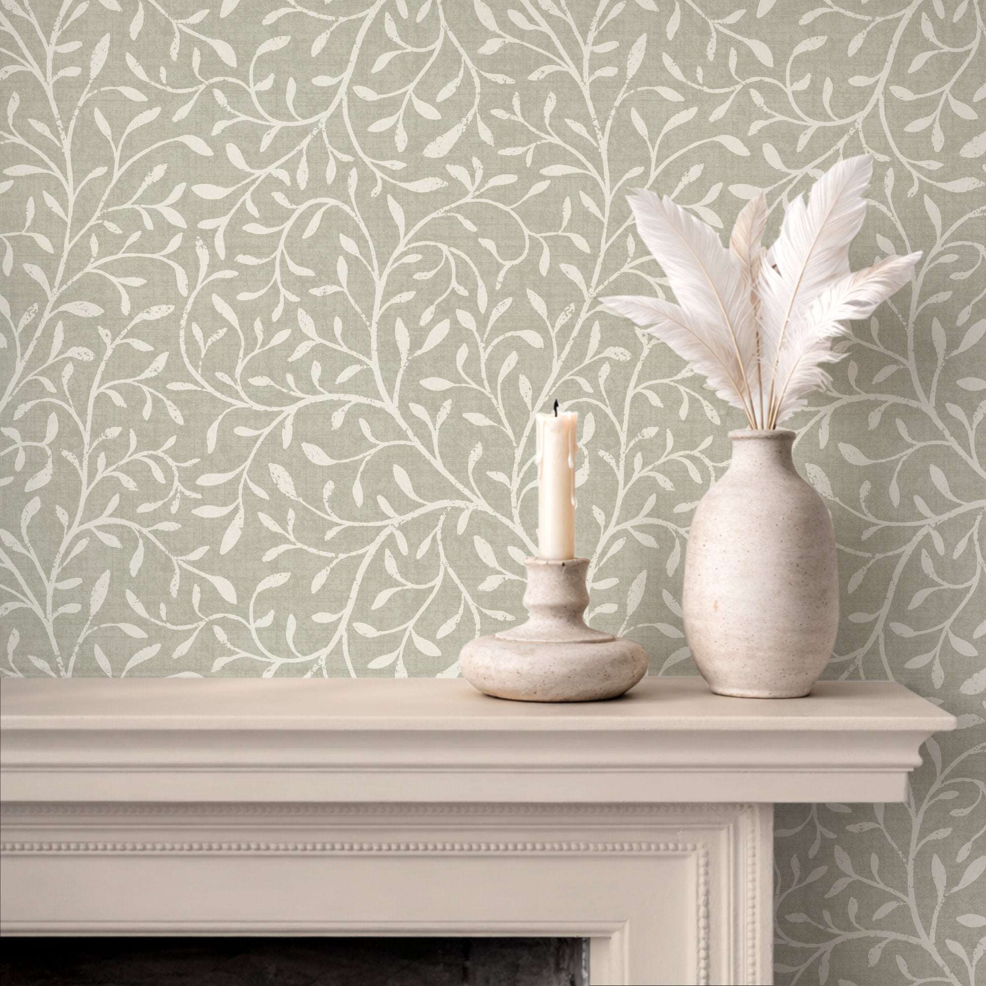 Botanical leaf silhouette wallpaper with white vine pattern on light gray-green background