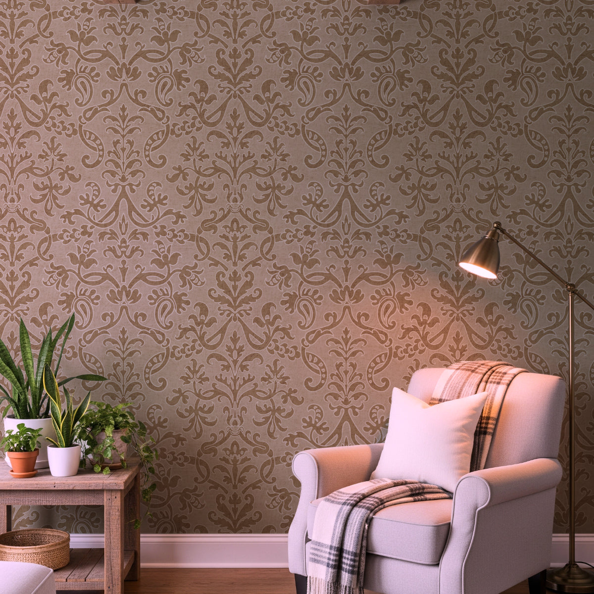 Contemporary living room with golden tan Victorian damask wallpaper, white armchair, and potted plant.