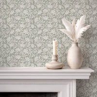 Japandi botanical wallpaper in warm stone grey on fireplace wall with neutral decor
