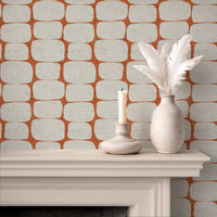 Mid-century modern wallpaper in Terracotta on fireplace wall with neutral MCM living room decor