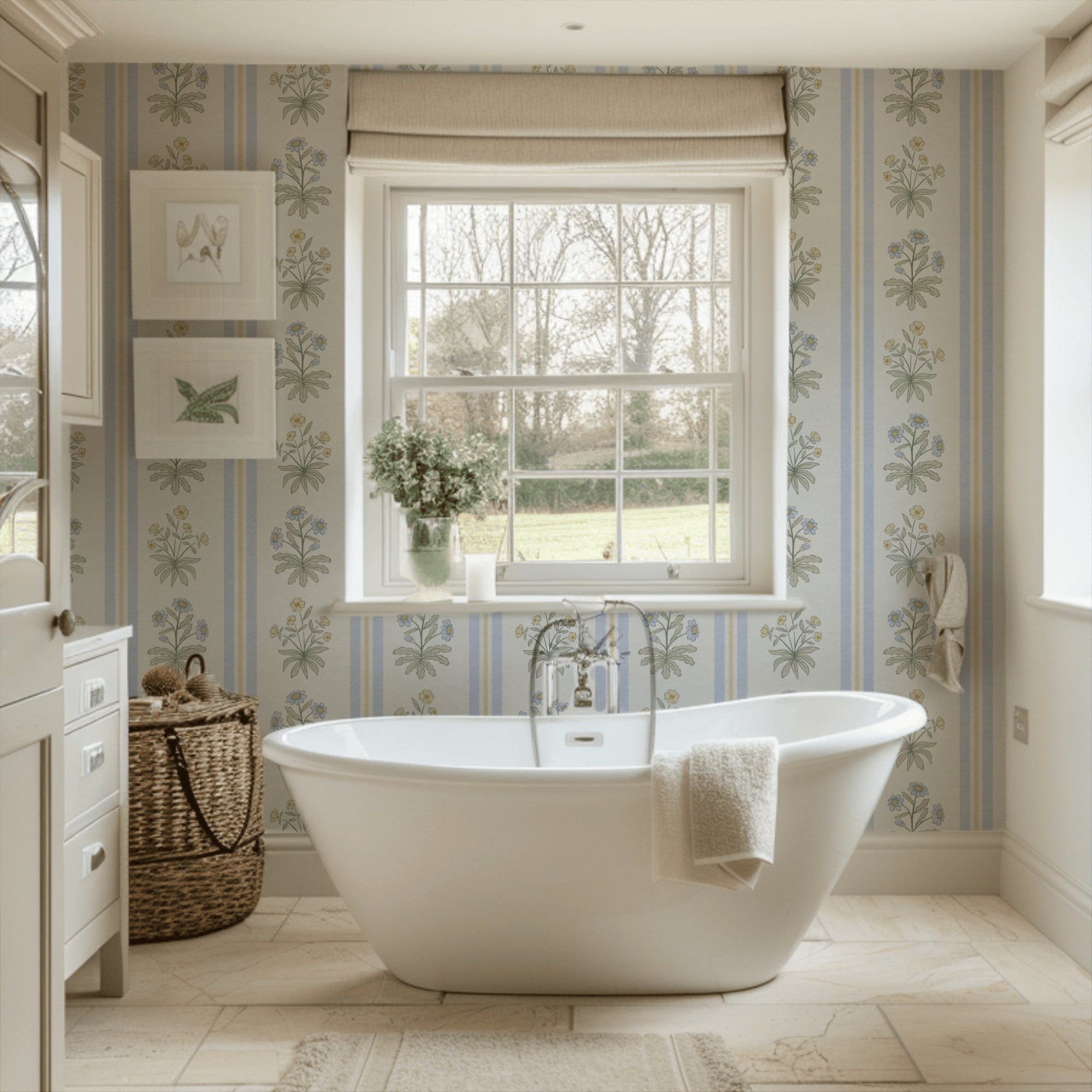 Blue and yellow floral striped wallpaper in a classic bathroom with a freestanding bath and large window
