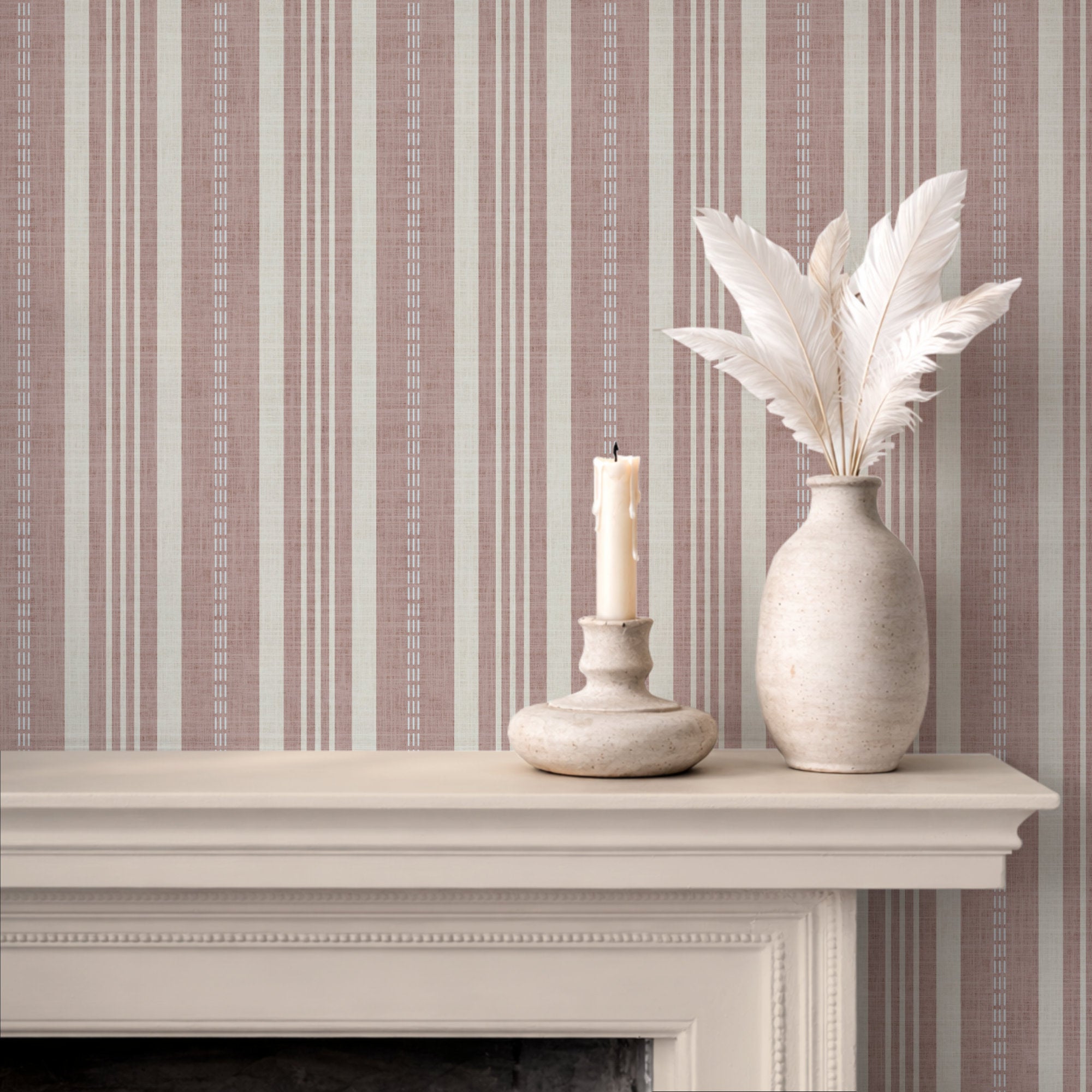 Elegant room featuring ticking stripe wallpaper with light vertical stripes and decorative vase with feathers.