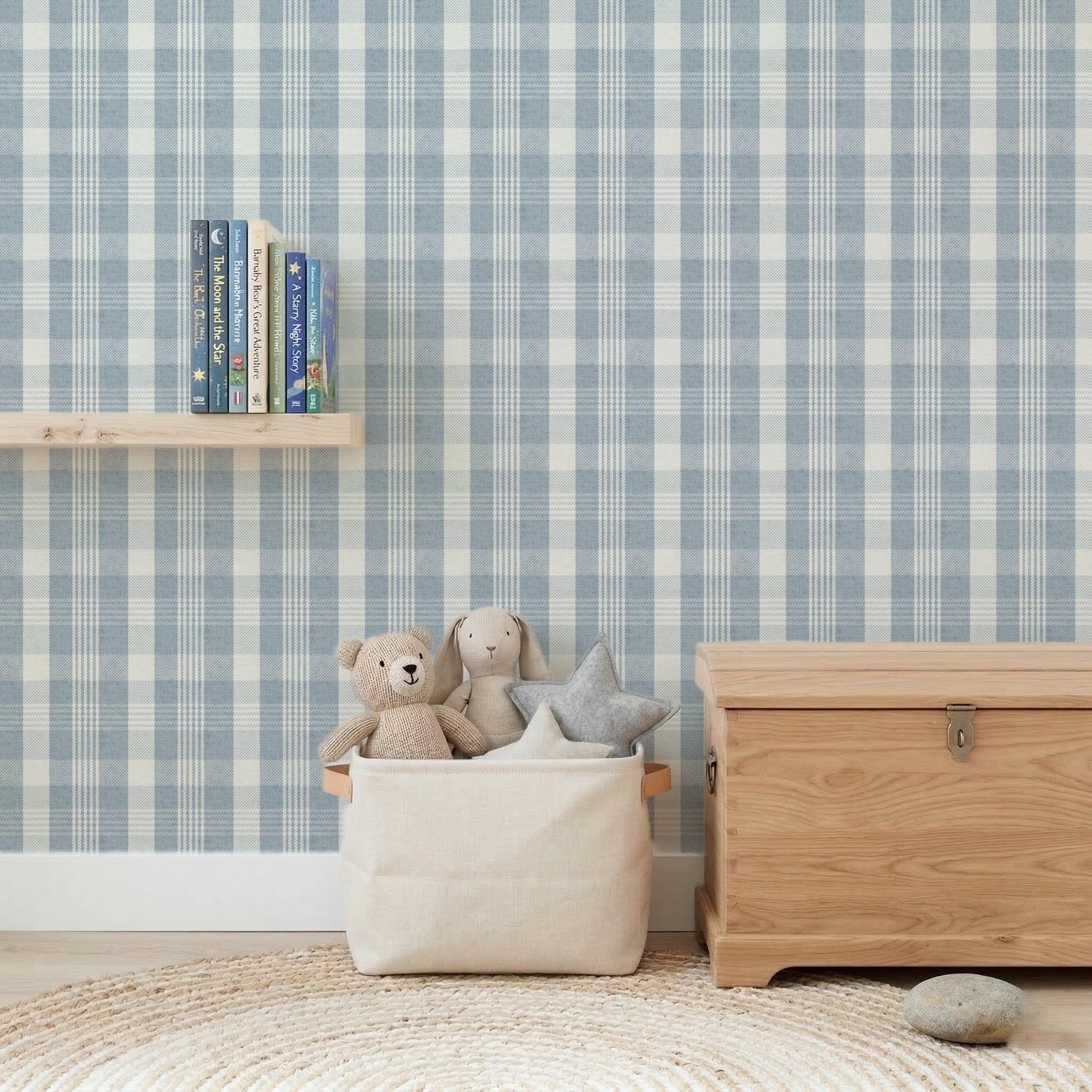 Soft denim blue plaid wallpaper in nursery with wooden chest and soft toys