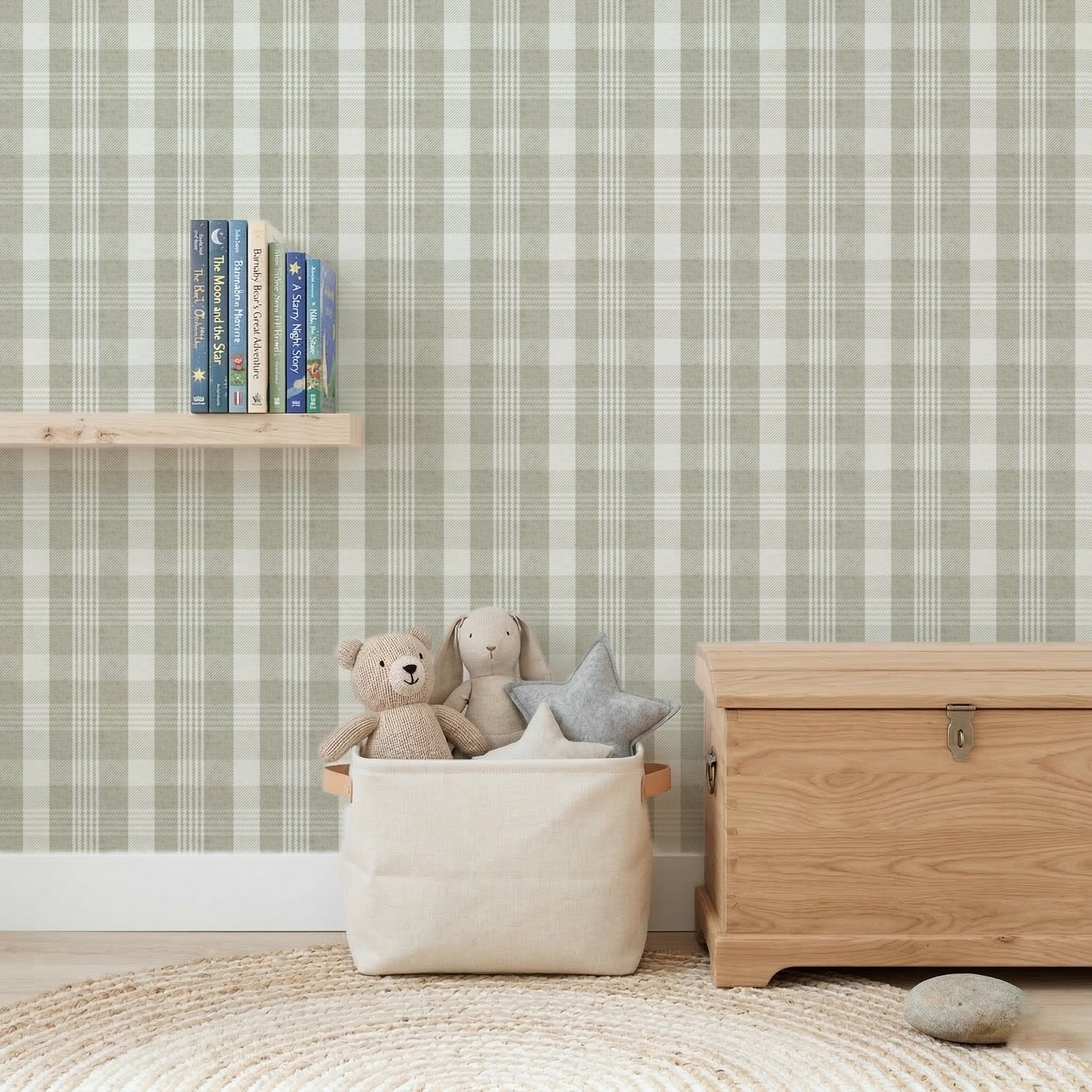 Sage green plaid wallpaper in nursery with wooden chest and soft toys